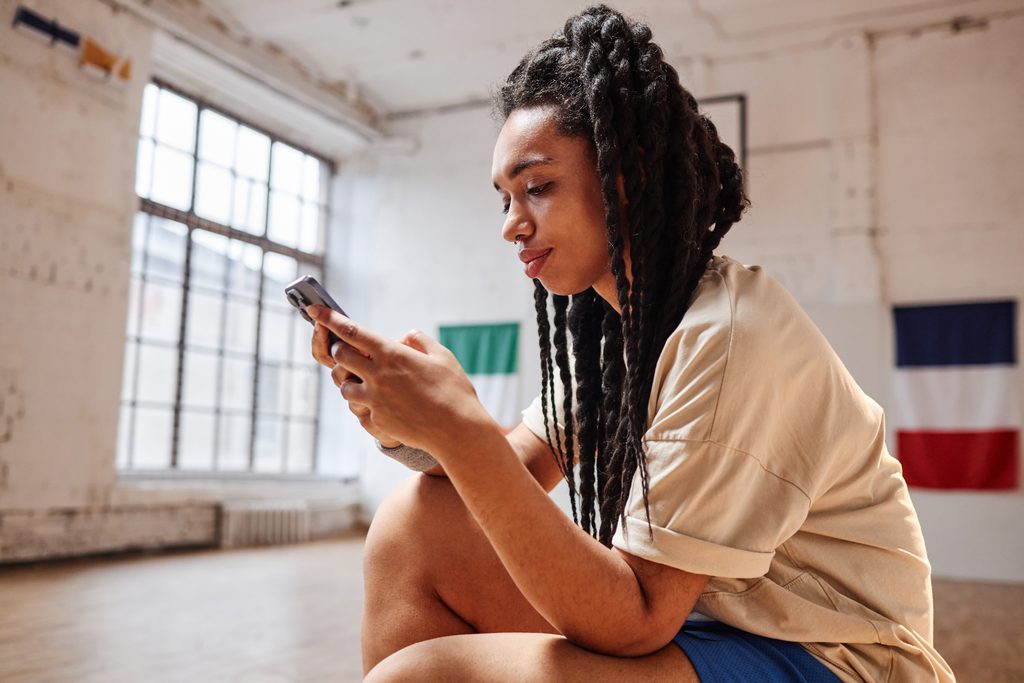 Teen using a mobile phone